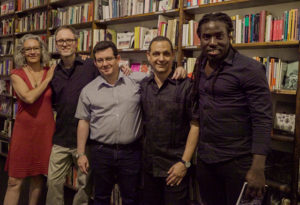 Durante la presentación de Iliada Ediciones en Berlín. La librera Teresa Cosci y los escritores Amir Valle, Luis González y Hendrik Rojas, mayo 2018.